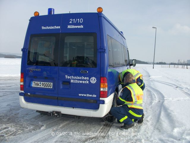 Auflegen von Gleitschutzketten